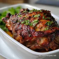 Cordero Asado al Horno: Piel Crujiente y Jugosa